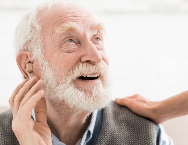 Senior Adult Wearing Hearing Aids