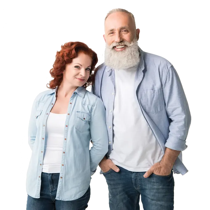 Happy senior couple during home hearing aid fitting session in London.